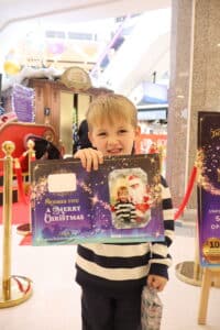 Boy with santa photo